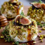 Pistachio-Crusted Brie Rounds with Fig Jam Glaze