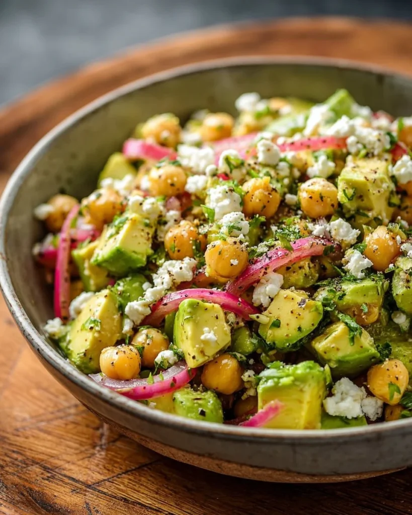 Chickpea Feta Avocado Salad with fresh ingredients in a bowl