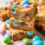 Easter Egg Blondies with colorful chocolate eggs on top