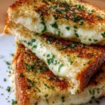 Garlic Bread Grilled Cheese sandwich with melted cheese and garlicky crust