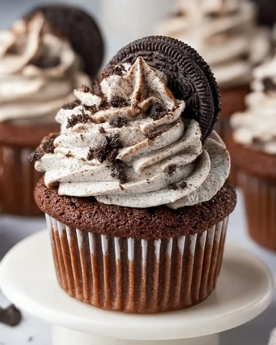 Delicious Oreo Cupcakes with creamy frosting and Oreo cookie topping
