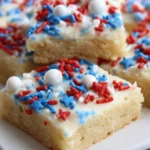 Delicious 4th of July sugar cookie bars decorated with patriotic colors