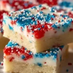 Delicious patriotic sugar cookie bars decorated for star-spangled holidays