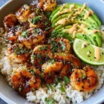 Delicious Teriyaki Shrimp Rice Bowl with vibrant vegetables and garnishes